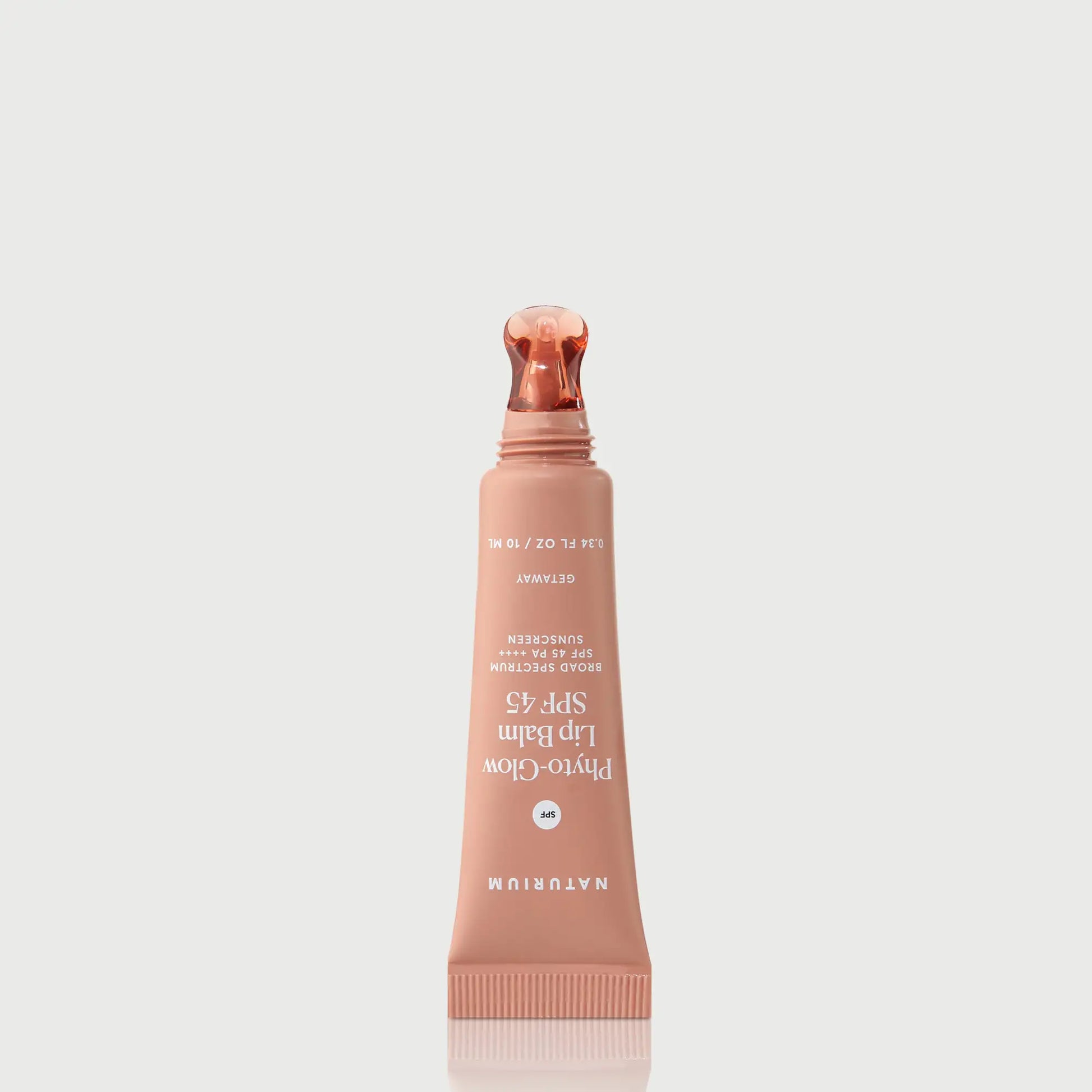 phyto-glow-lip-balm-spf-45-getaway-g9 NATR-10126_PhytoGlow_SPF_Getaway_primary_nocap_bonebkgd_1.webp