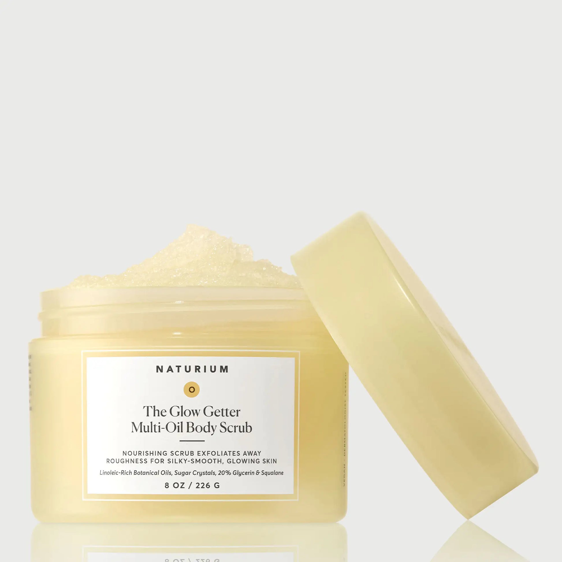 the-glow-getter-multi-oil-body-scrub-z5 NATR-40028-GlowGetter-Multi-Oil-Body-Scrub-Front-CapOff-bonebkgd.webp