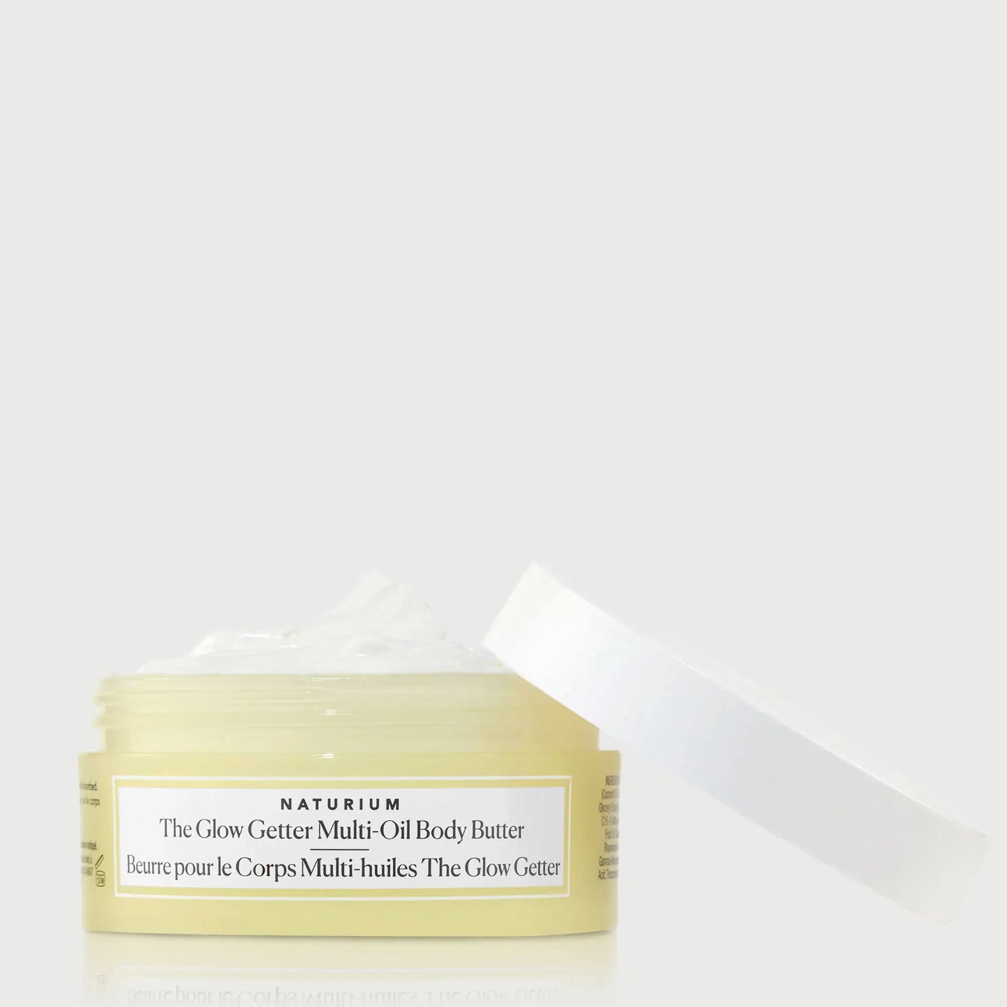 the-glow-getter-multi-oil-body-butter-travel-size-q1 NATR-40115_Glow-Getter-Body-Butter-Mini_front_capoff_bonebkgd.webp